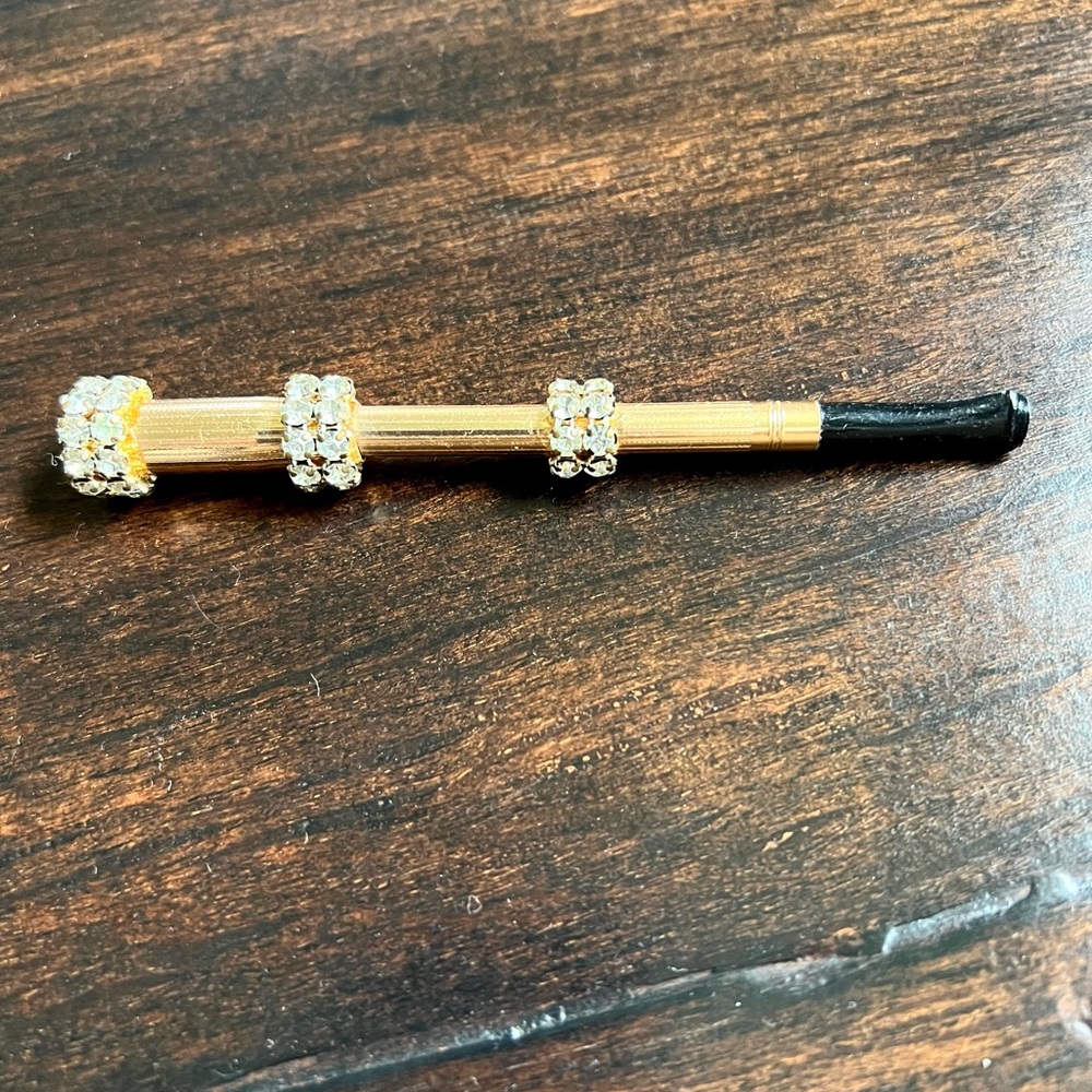 Vintage cigarette holder with diamond looking stones for sparkle and pizzazz